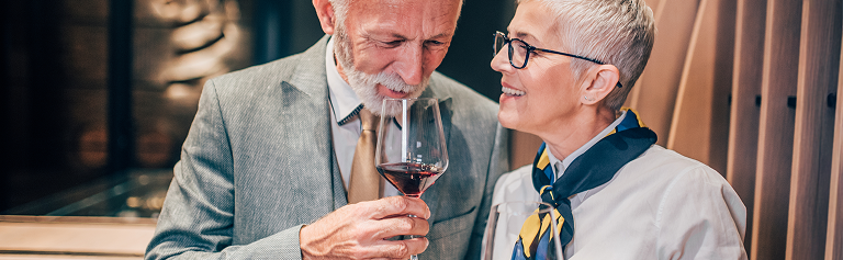 Man and woman enjoying wine